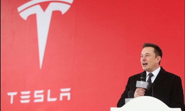 Tesla projects EV sales growth ‘lower’ in 2024