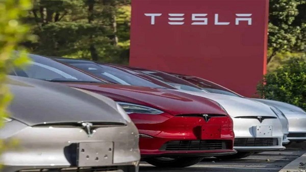Tesla share dips $73 billion in market value