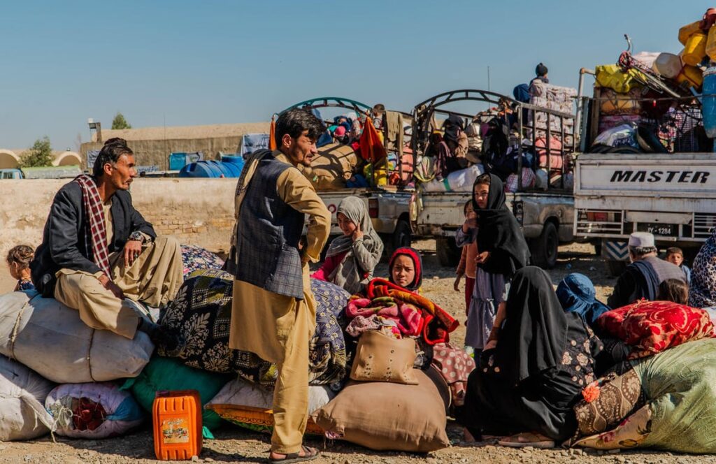 Top official calls global community to support Afghanistan as citizen returns home