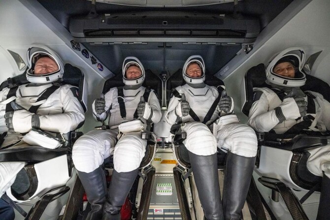 NASA says SpaceX brings 4 astronauts safely on Earth