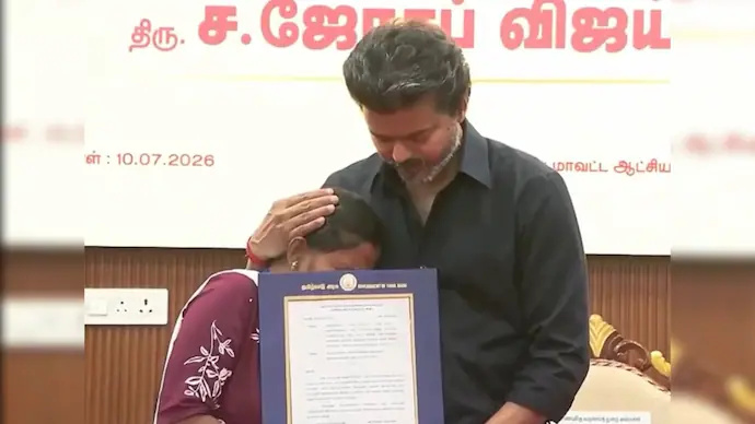 CM Vijay Hands Over Jobs to Karur Stampede Victims’ Families